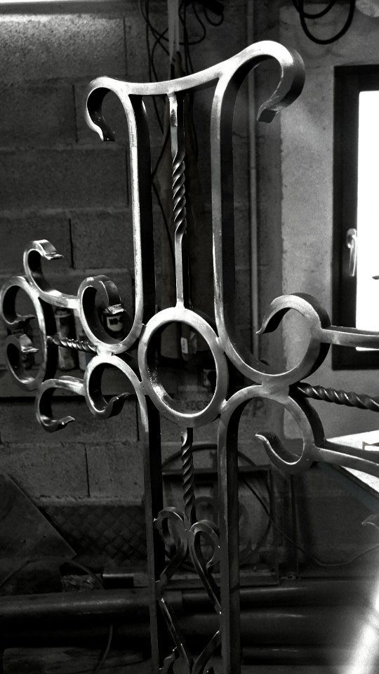 Video by LaFine Métallerie on May 13, 2026. May be a black-and-white image of turnstile, candle holder, furniture, rack and text.